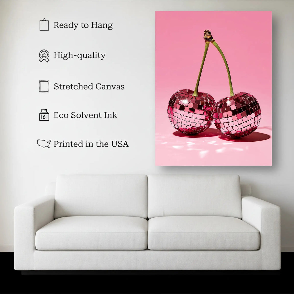 Disco Cherries canvas hanging on a living room wall above a white sofa