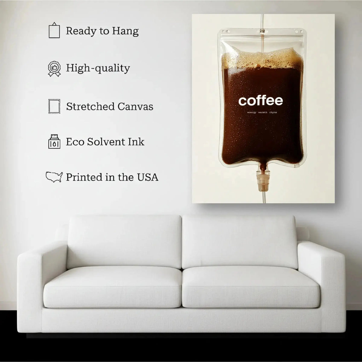 Coffee Drip canvas hanging on a living room wall above a white sofa