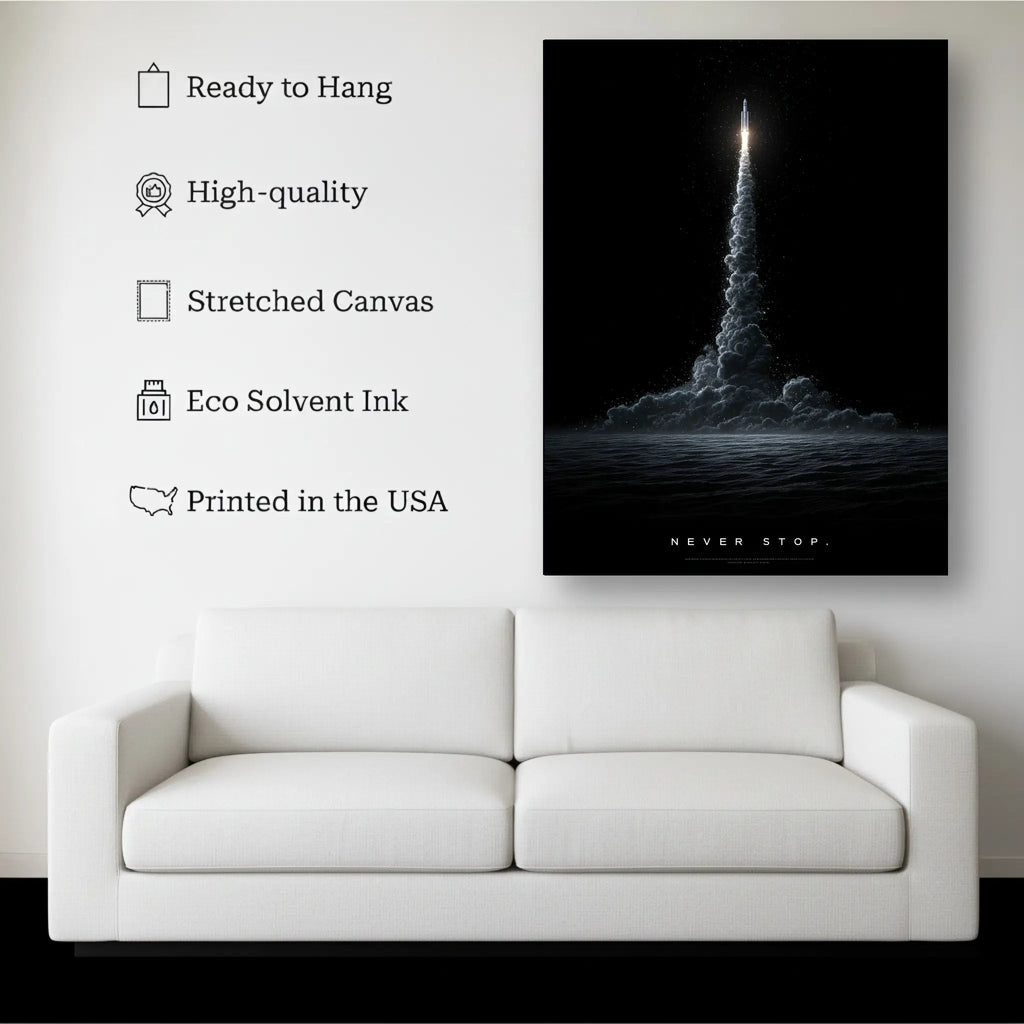 Never Stop canvas hanging on a living room wall above a white sofa